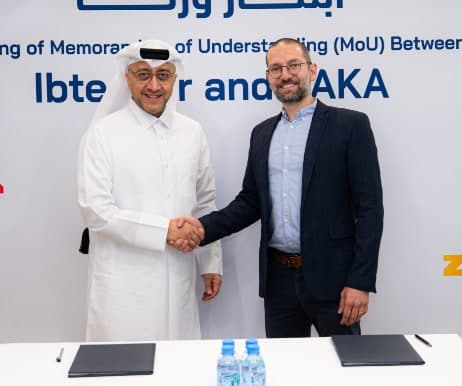 ZAKA and Ibtechar representatives shaking hands at the signing of their memorandum of understanding