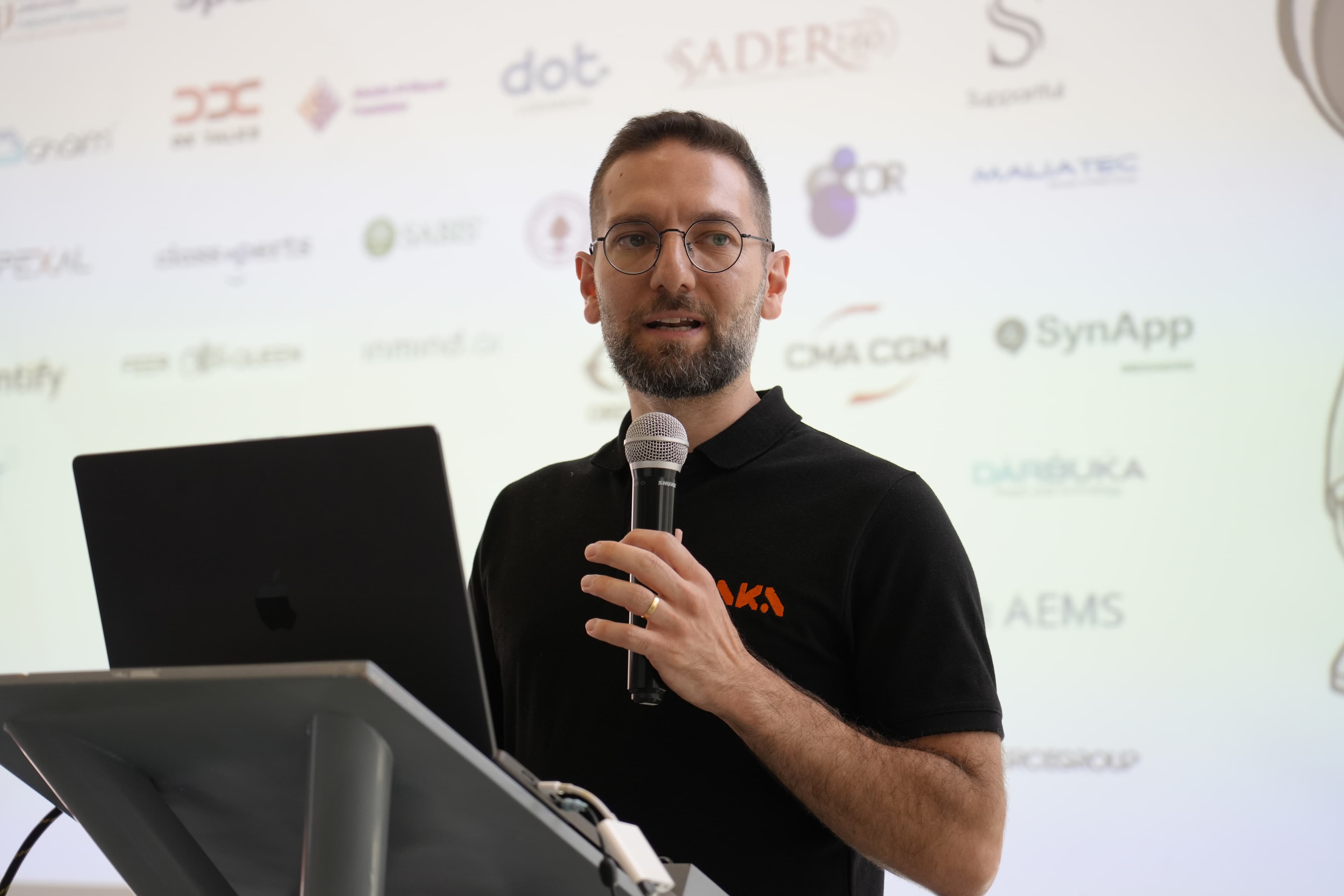 Christophe Zoghbi speaking at a ZAKA event